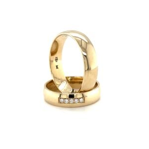 Obrączki ślubne 'Golden Commitment' z lśniącego złota 14k z brylantami, symbol trwałego zobowiązania